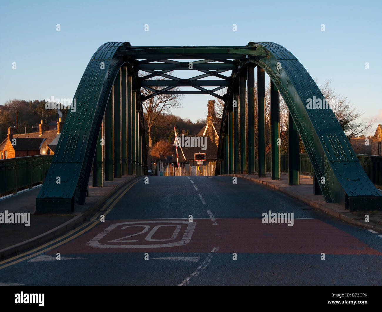 Steel riveted bridge in Ruswarp crossing river Esk Stock Photo