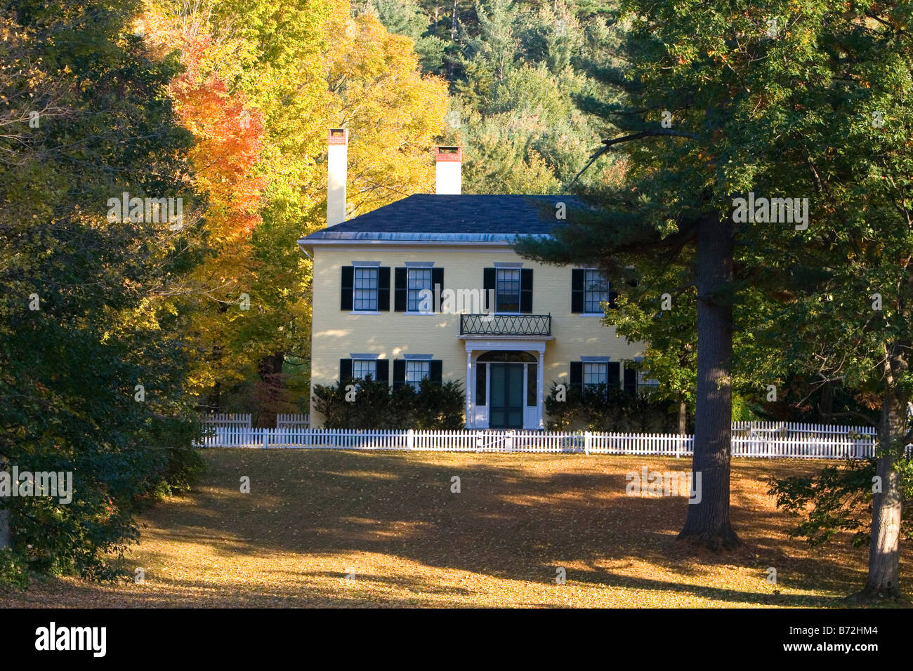 Residential home and fall foliage in the town of Orford New Hampshire