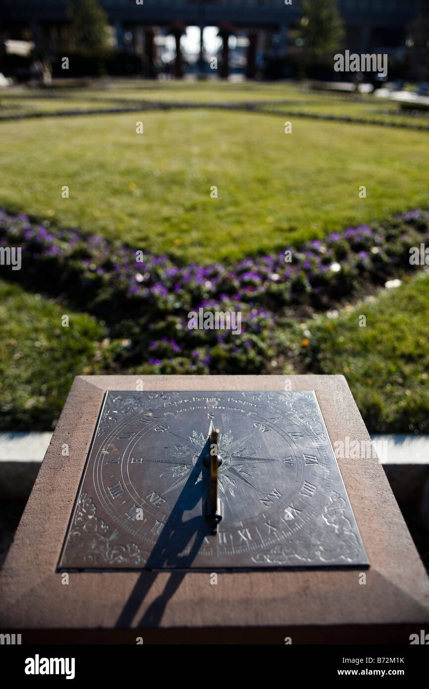Bronze sundial in garden Stock Photo Alamy