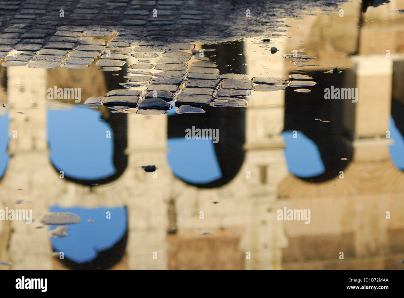 Rome Italy Cobblestones and refelection of the Colosseum Stock Photo