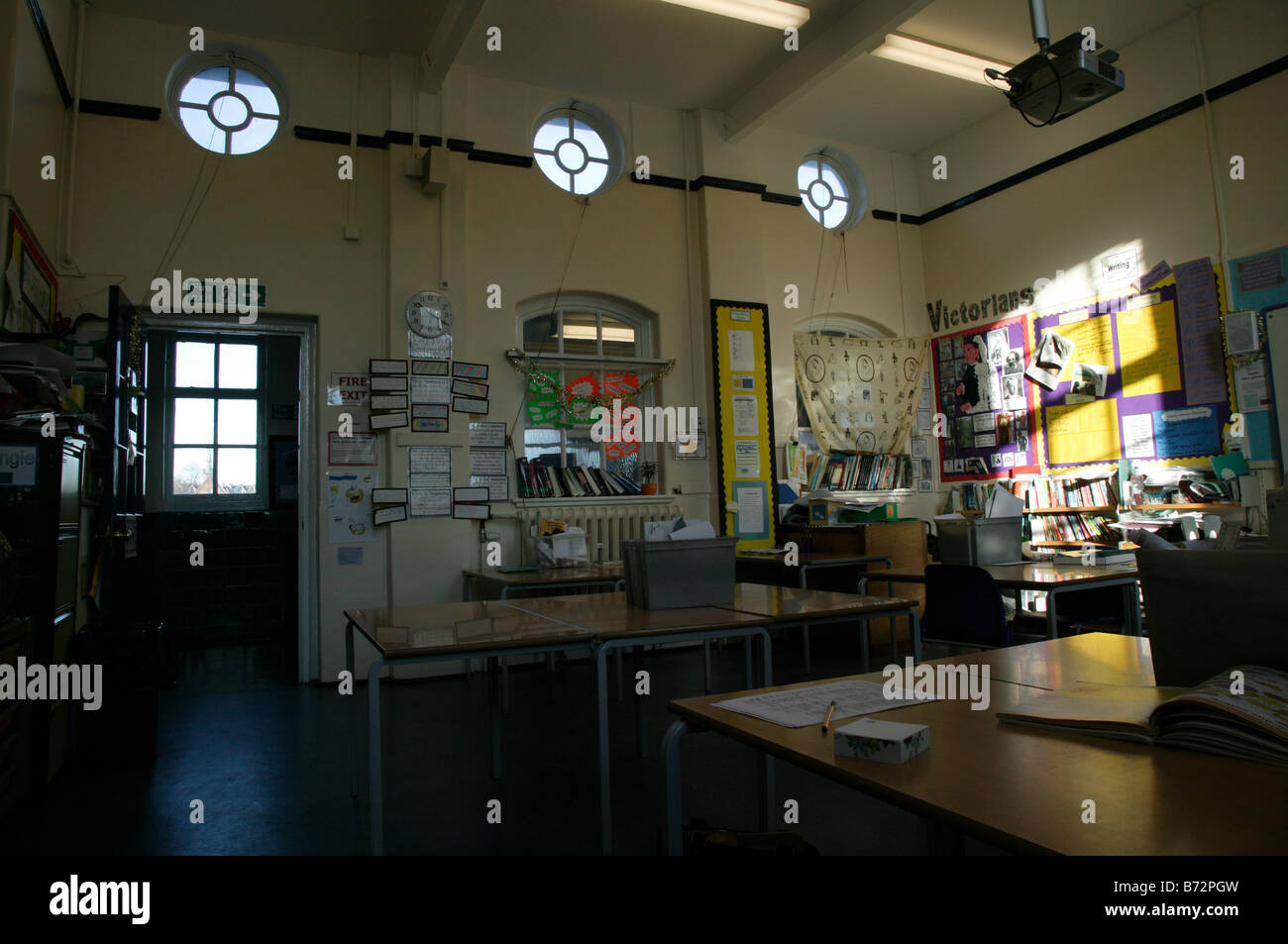 Shot of an empty classroom at Lewisham Bridge Primary School  showing project work about the Victorians Stock Photo