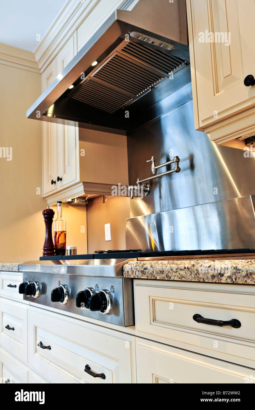 Interior of modern luxury kitchen with stainless steel appliances Stock Photo