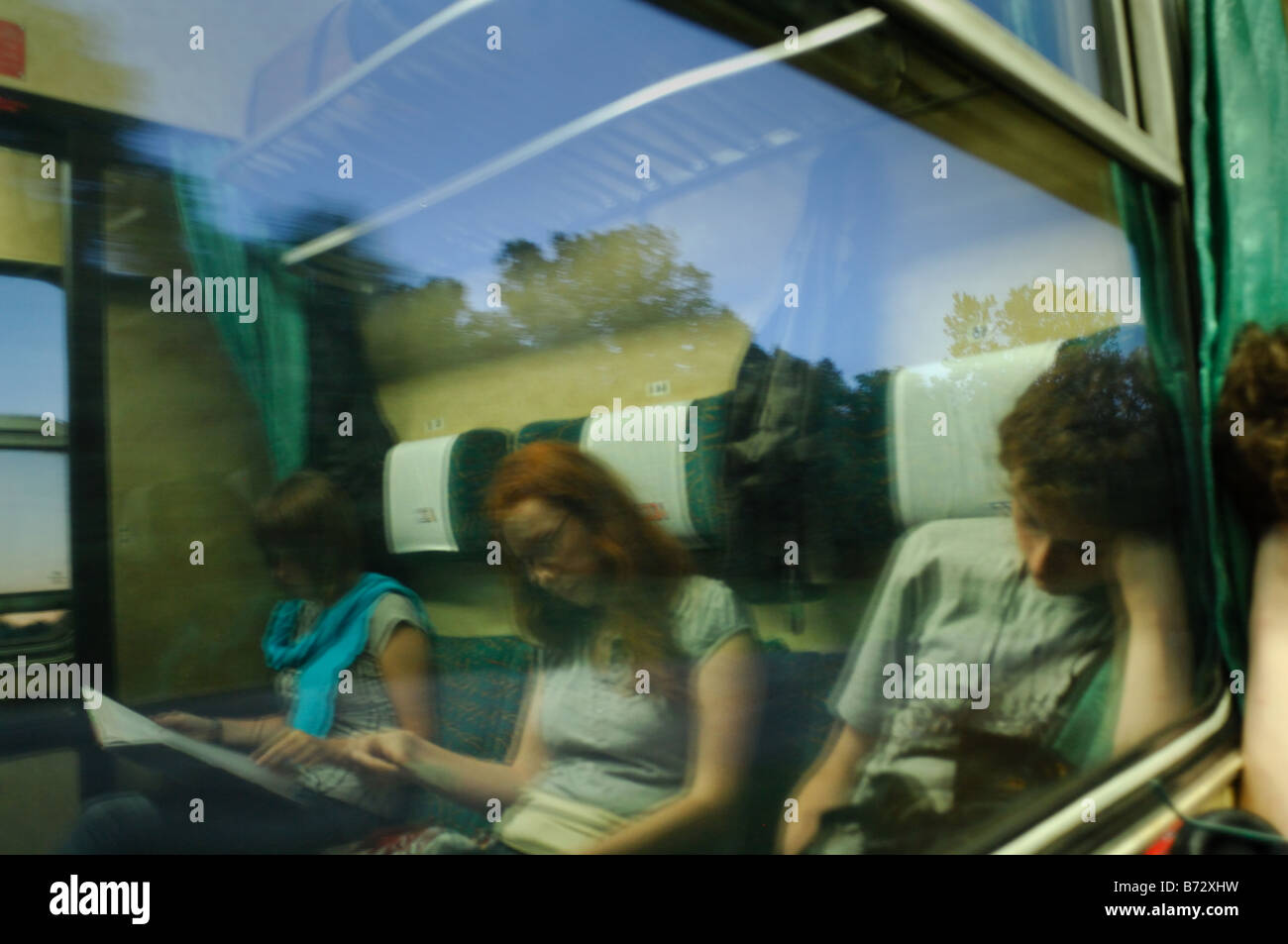 Passengers on a train in Poland from Warsaw to Krakow Stock Photo Alamy