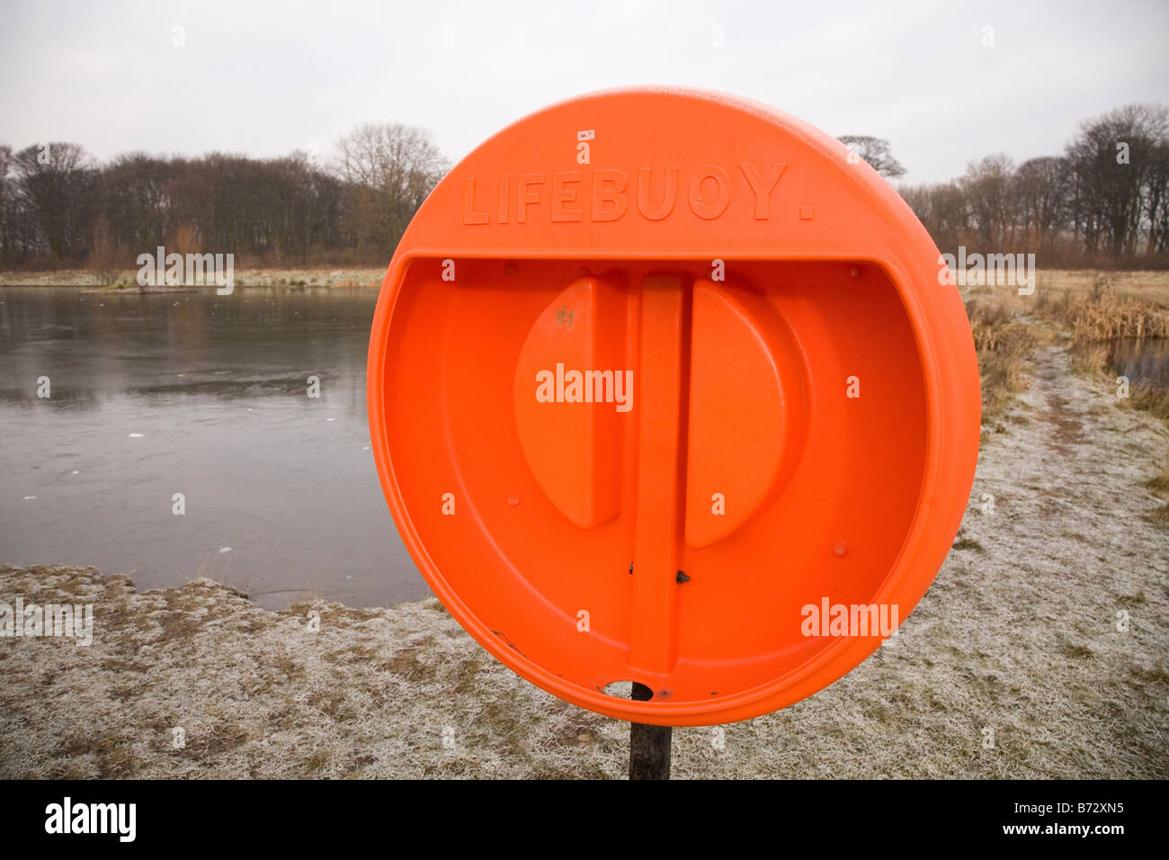 A life buoy holder stands empty in Herrington Country Park in Sunderland, England. Stock Photo