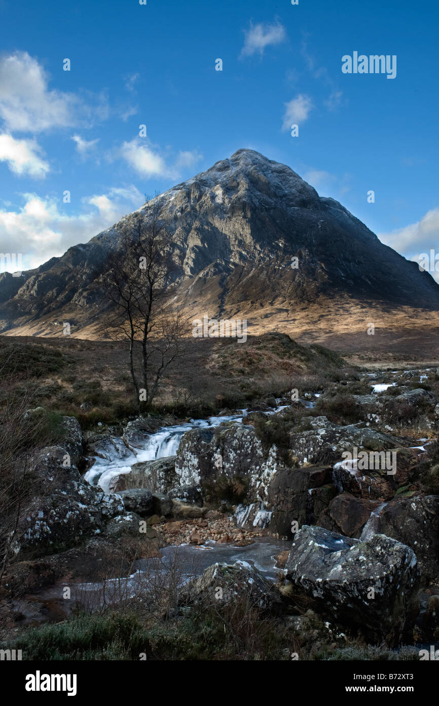 Buachaille Etive Mor in the picturesque pass of Glencoe with the river coe in the foreground Stock Photo