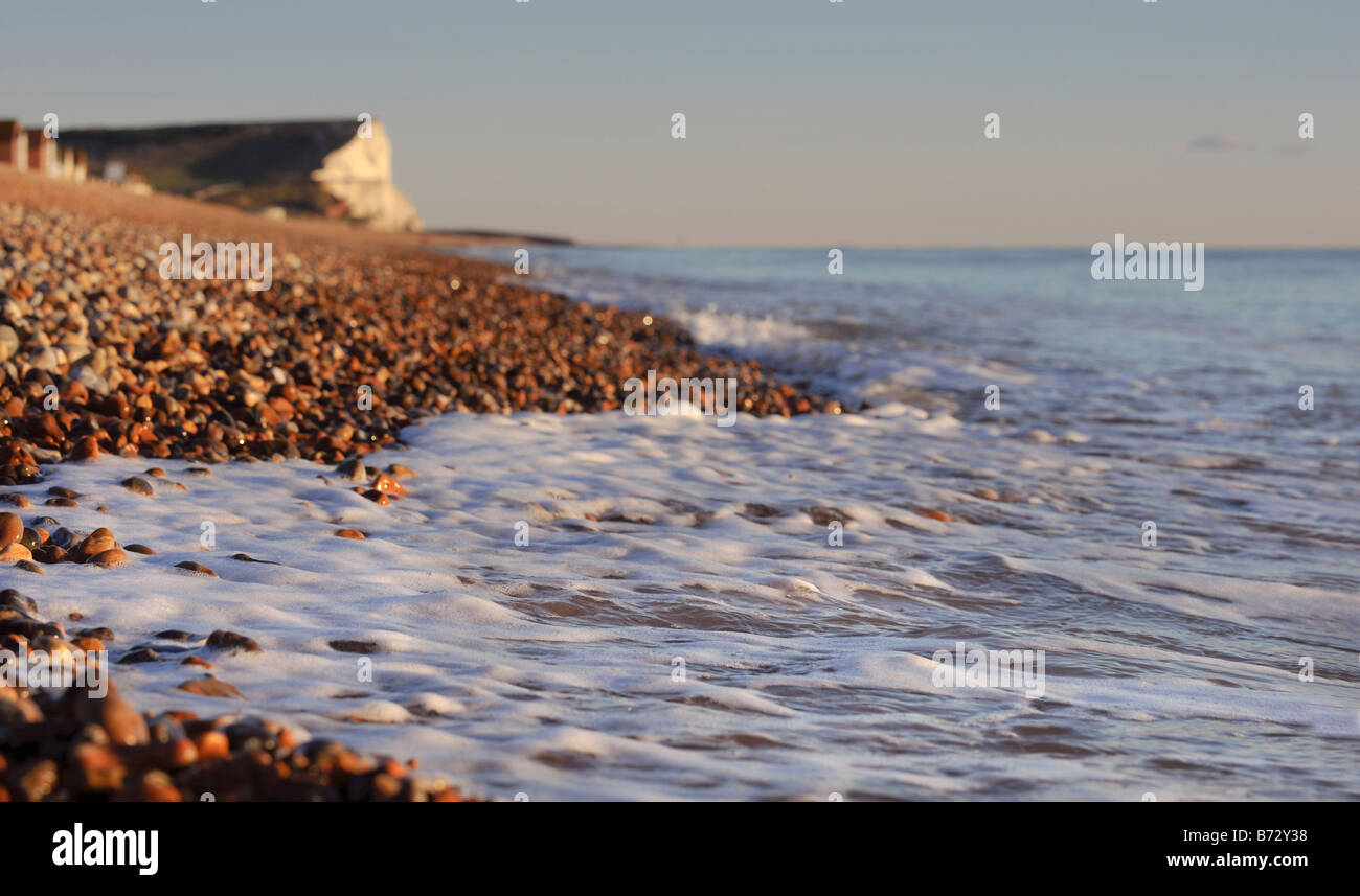 Seaford beach in East Sussex with Seaford Head in the distance. Picture by Jim Holden. Stock Photo
