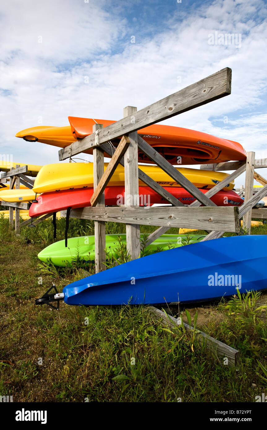 Brightly colored catamarans, kyaks, and boats at Compo Beach, Westport, Connecticut Stock Photo