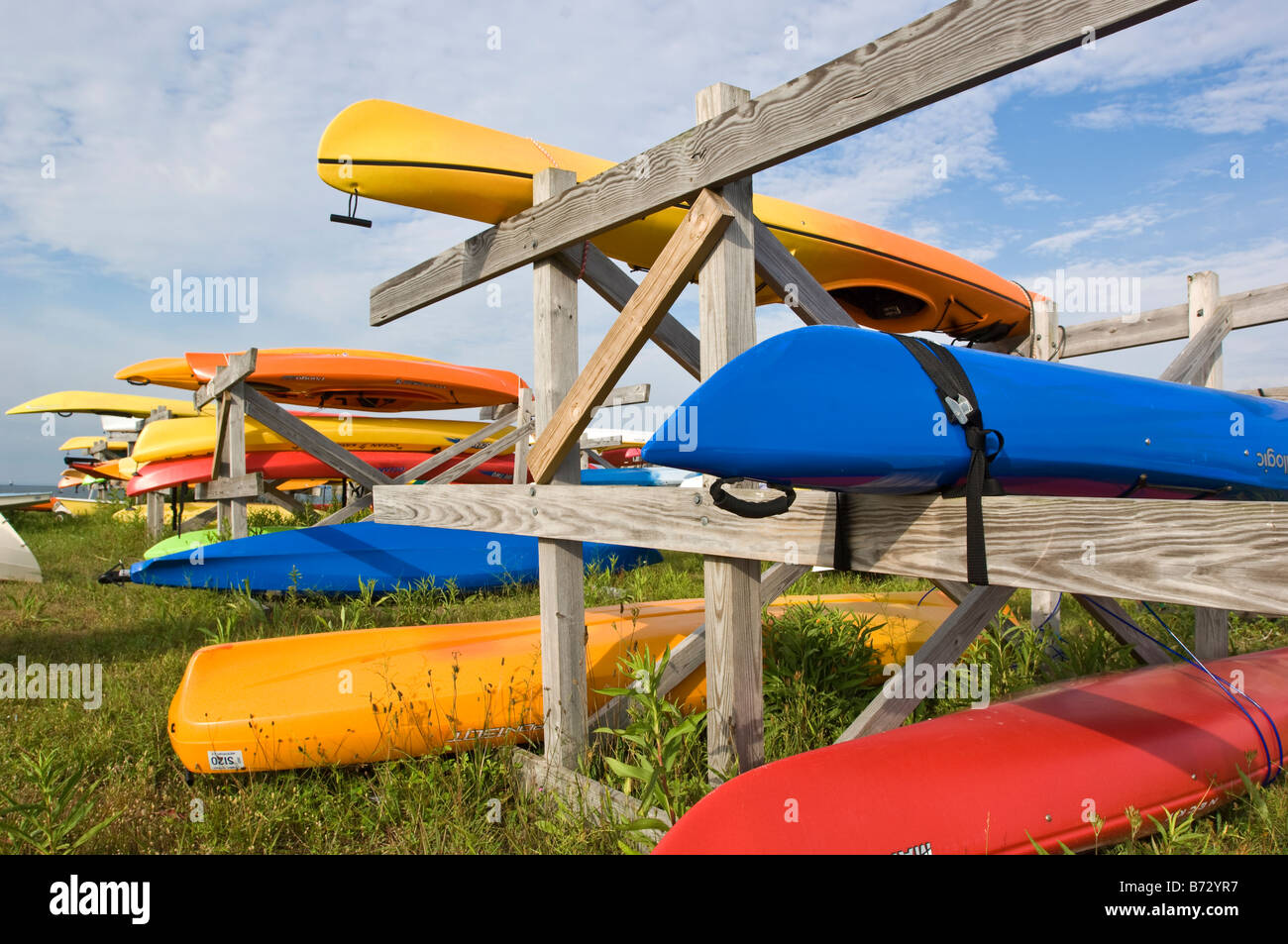 Brightly colored catamarans,kyaks, and boats at Compo Beach, Westport, Connecticut Stock Photo