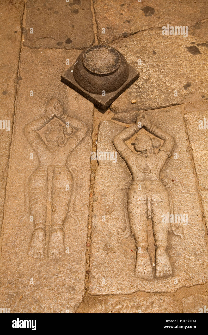 The forms of prone women are sculpted into the grounds of the Subrahmanya Temple close to Alappuzha in Kerala, India. Stock Photo