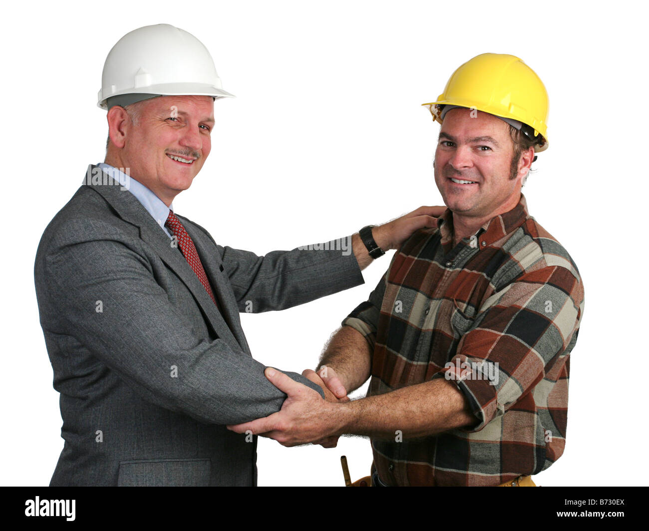 an architect and construction foreman greeting eachother at the start