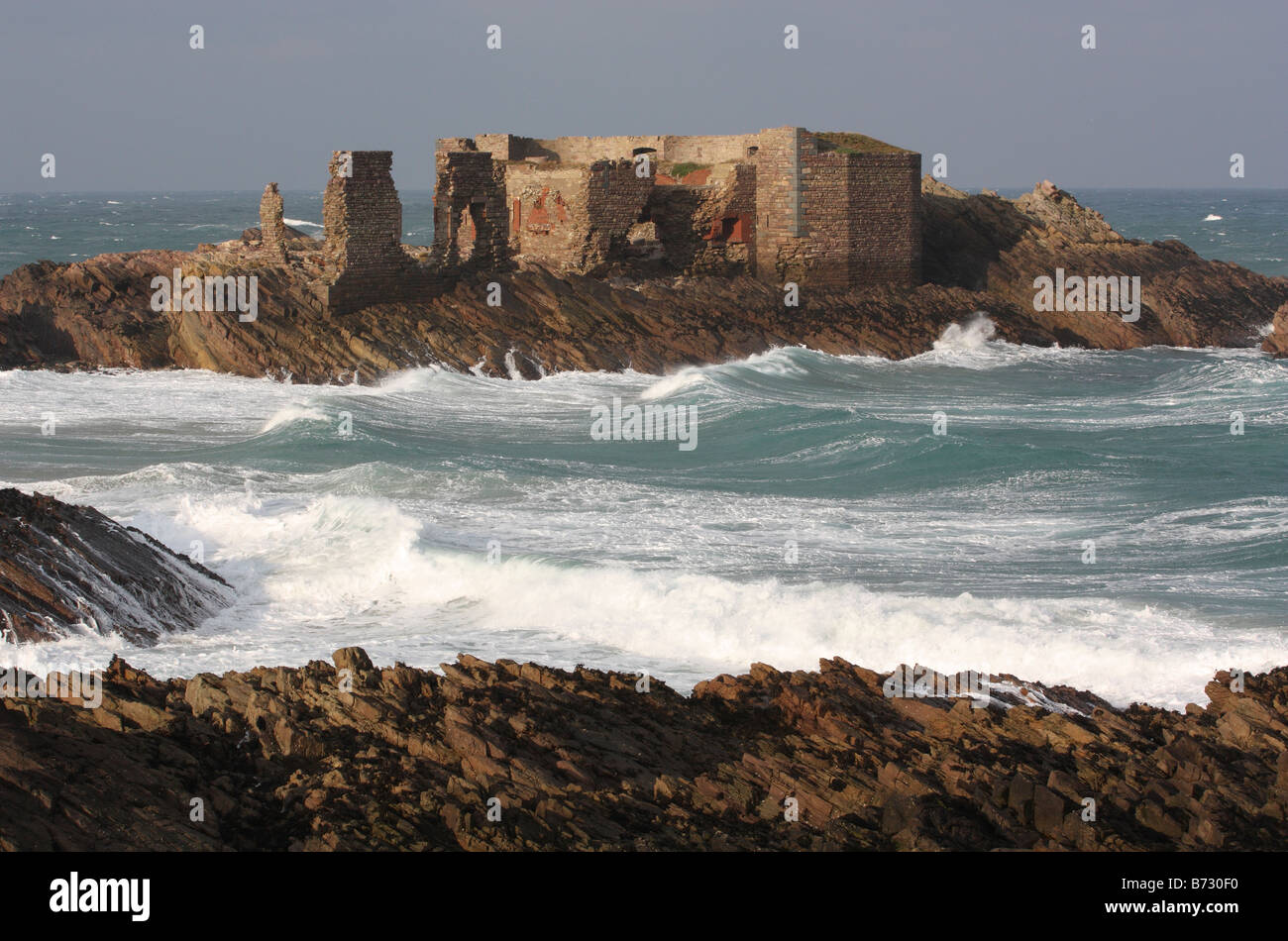 British Channel Islands. Alderney. Coastal ruin of Victorian Fort Les Hommeaux Florains. Stock Photo