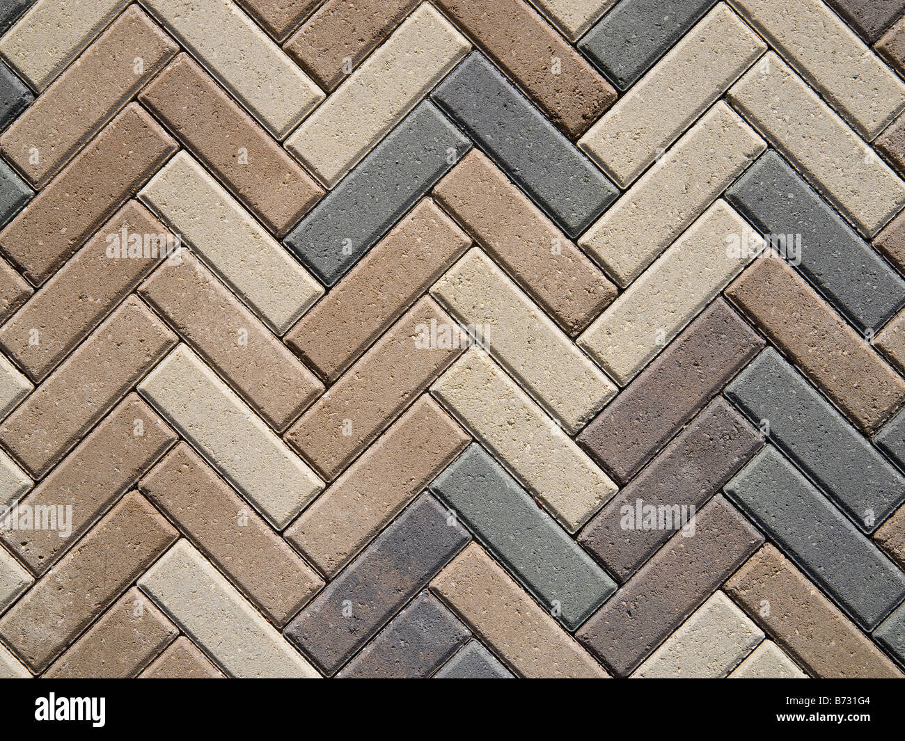 Brick pavers in a herringbone pattern Stock Photo - Alamy