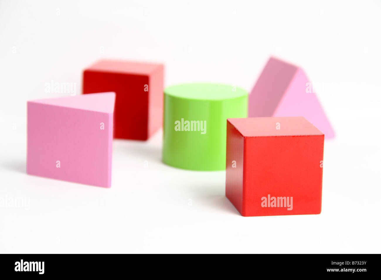 colourful wooden children's building blocks scattered apart Stock Photo