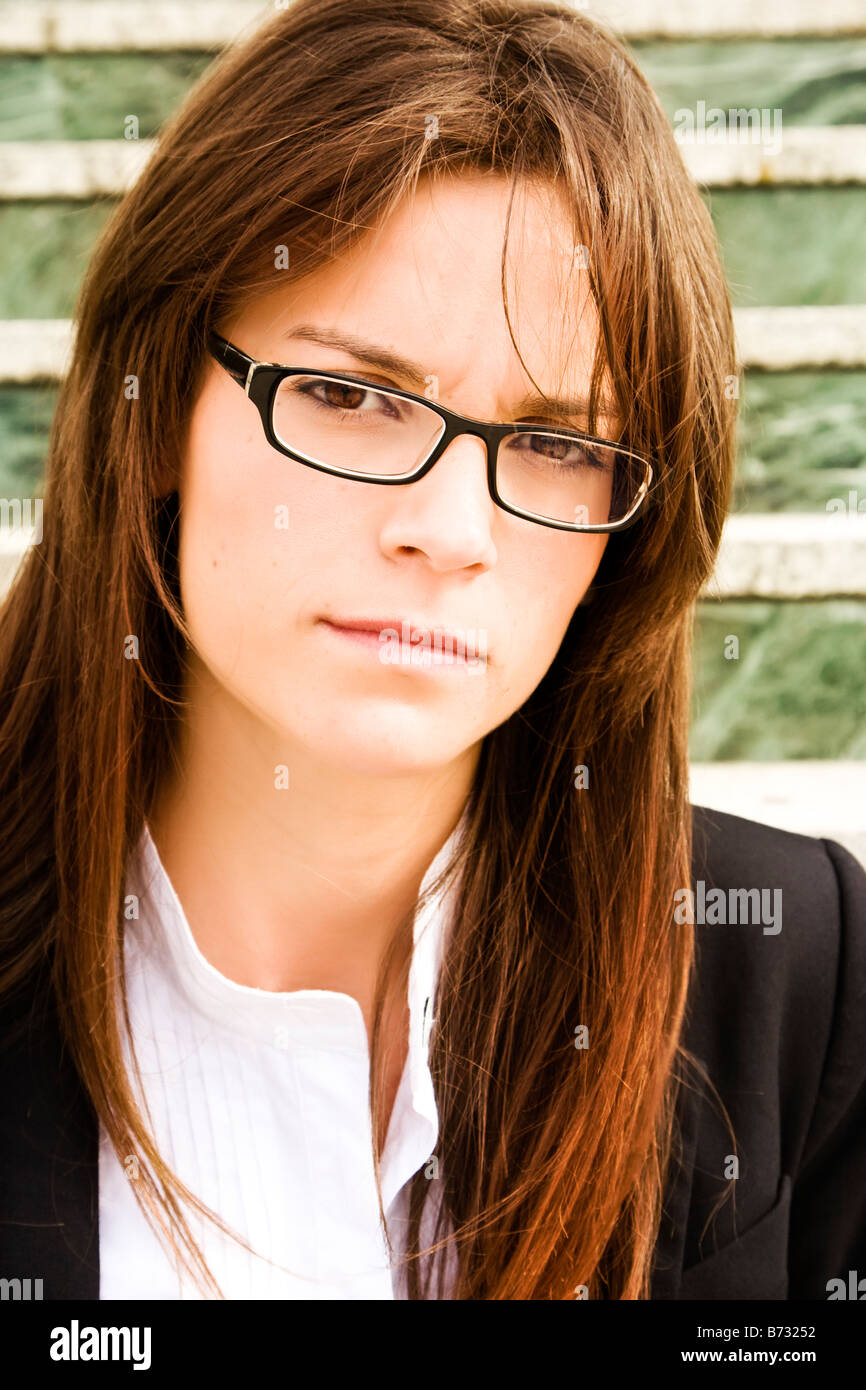 Young businesswoman staring at camera Stock Photo
