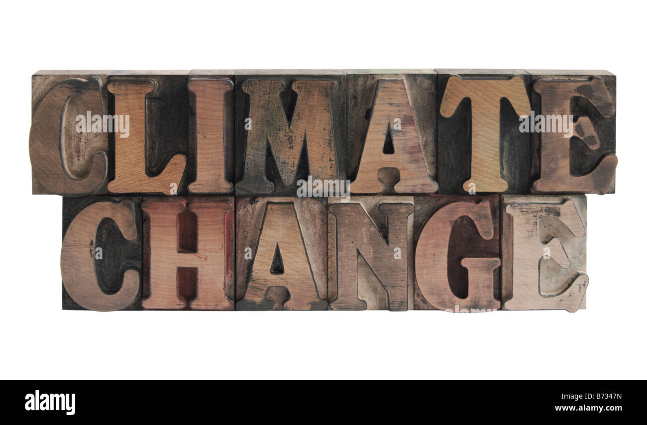 the words 'climate change' in old ink-stained wood type Stock Photo
