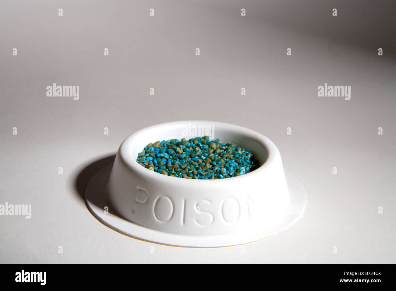 Rat poison killer mouse mice vermin deadly pellets red danger Stock