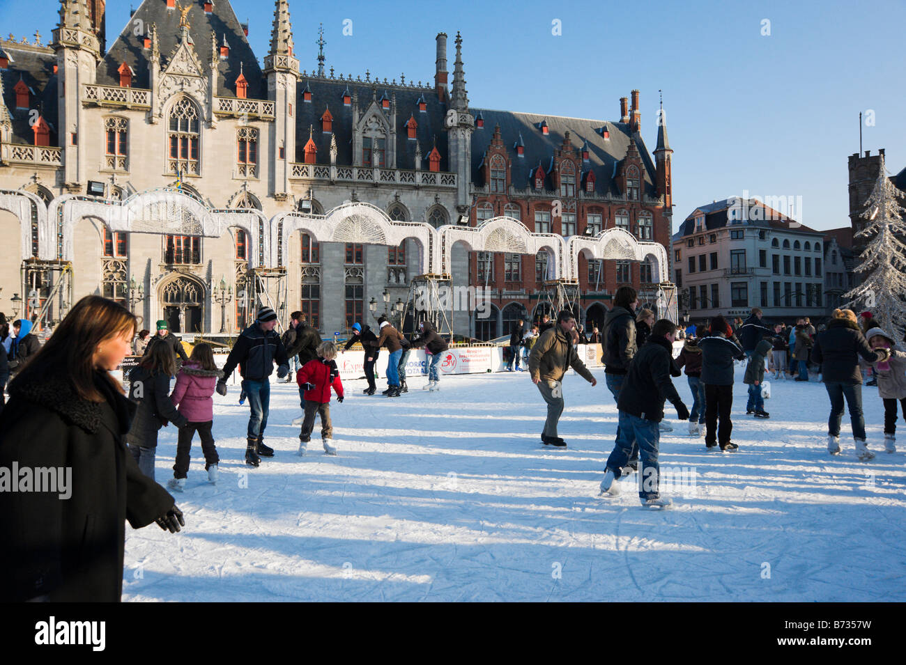 Skating Rink at the Christmas Market in the Grote Markt (Main Square), Bruges, Belgium Stock Photo