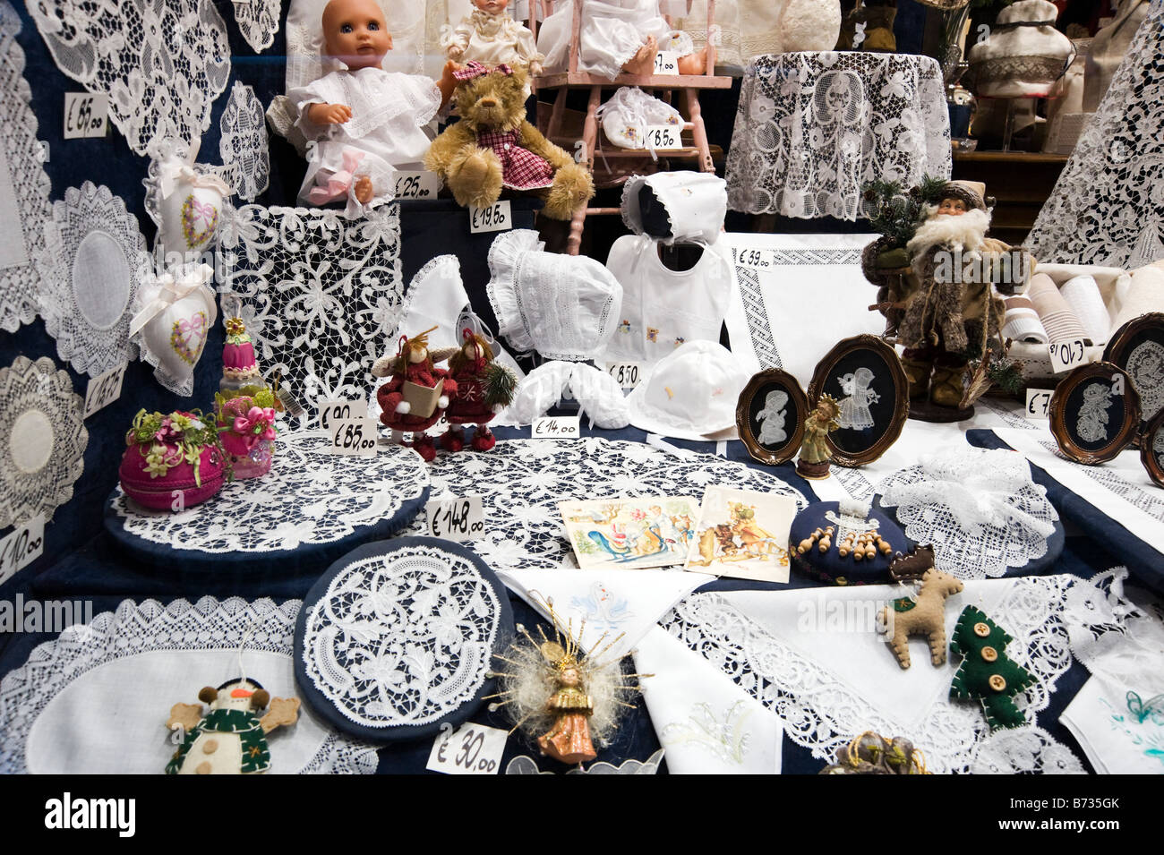 Display of lace items in a shop window in the old town, Bruges, Belgium Stock Photo