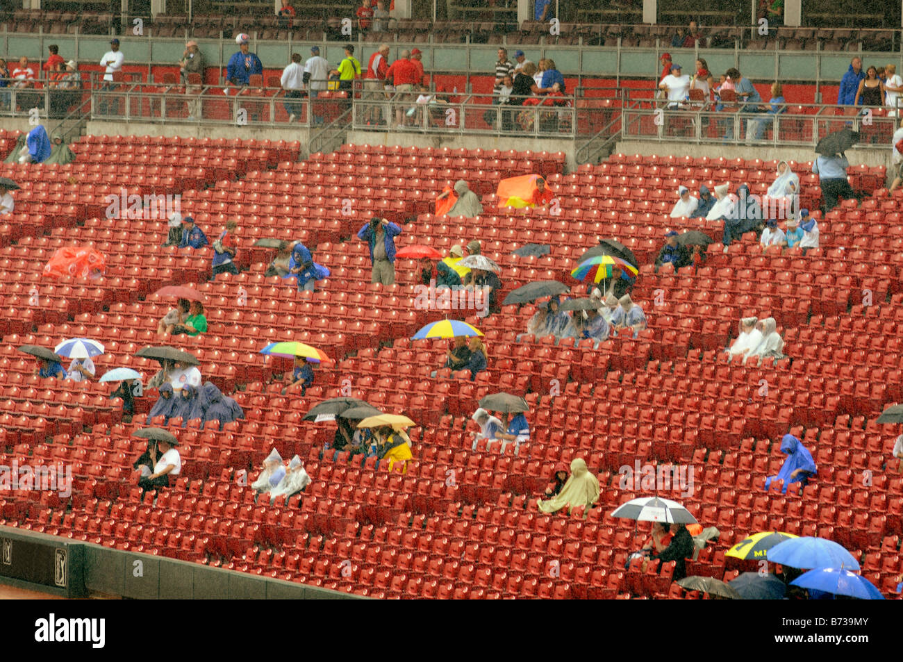 Fans in rain hires stock photography and images Alamy