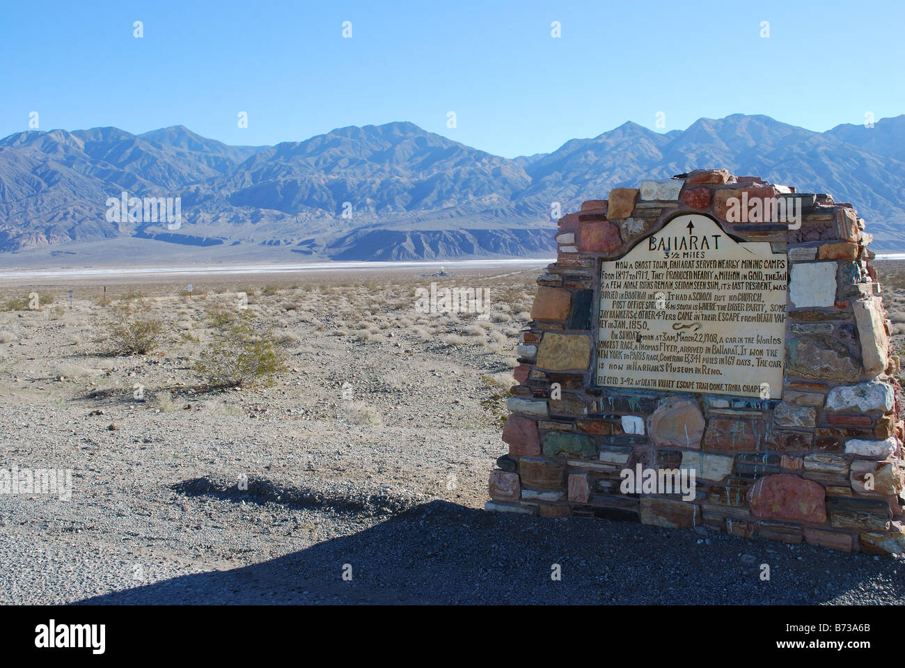 highway marker for Ballarat a ghost town on the edge of the Panamint Mountains in Death Valley National Park CA USA Stock Photo