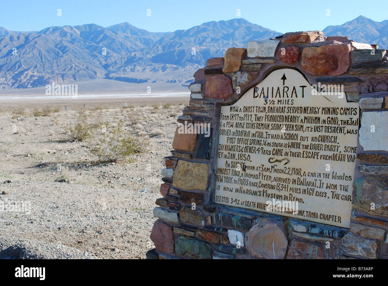highway marker for Ballarat a ghost town on the edge of the Panamint Mountains in Death Valley National Park CA USA Stock Photo