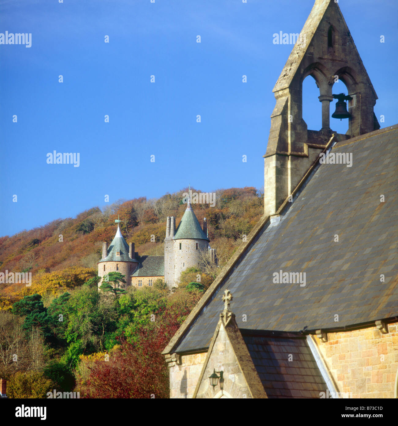 Castell Coch with St Saint Michael and all Angels Church in foreground, Tongwynlais, Cardiff, Wales. Stock Photo