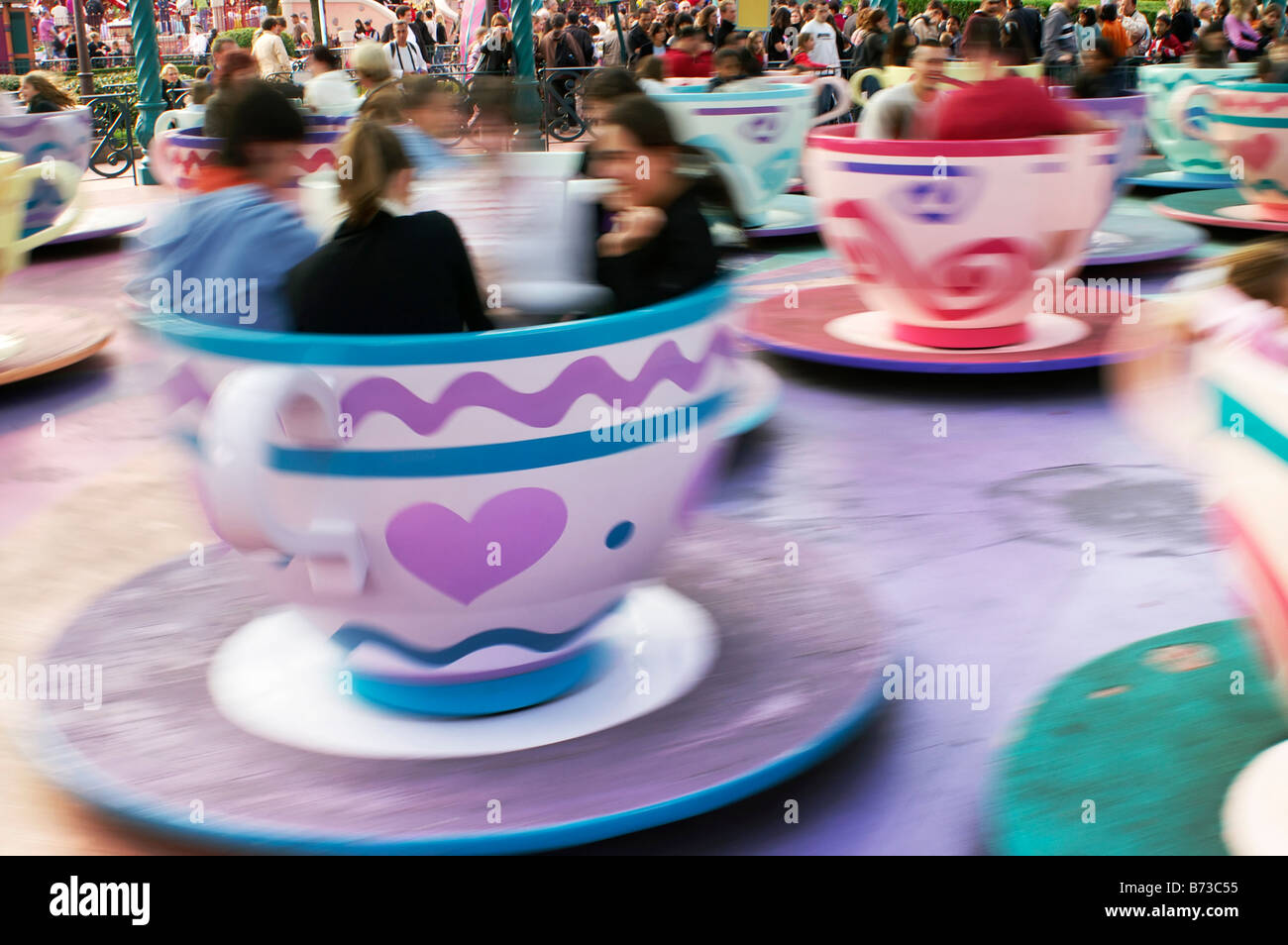 Tourists spinning in teacups Disneyland Paris Stock Photo