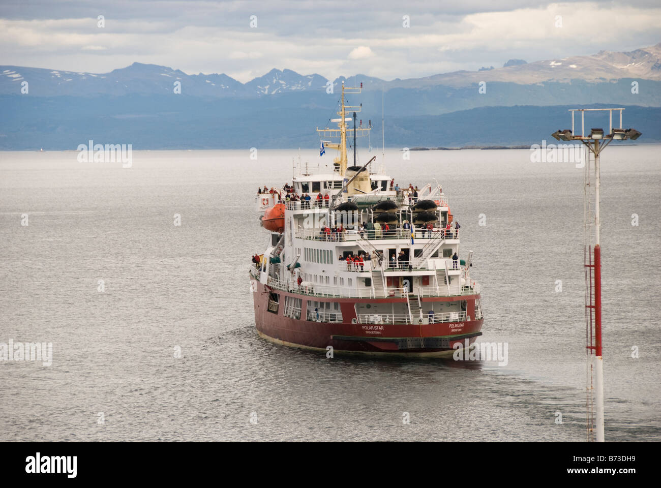 Icebreaker turned cruise ship leaveing port at Ushuaia Stock Photo