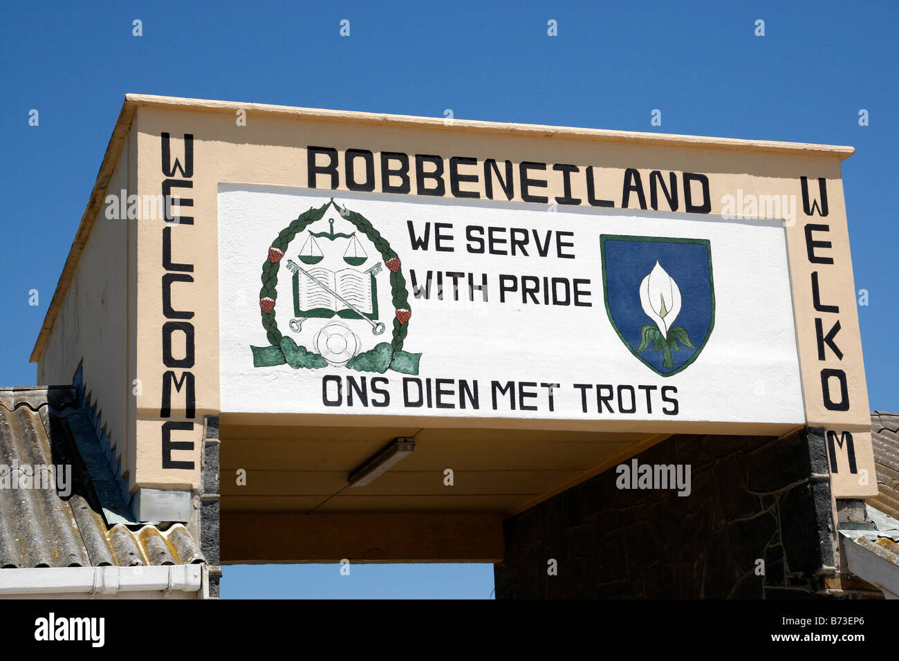 gate to robben island prison with the prison officers motto we serve with pride cape town south africa Stock Photo