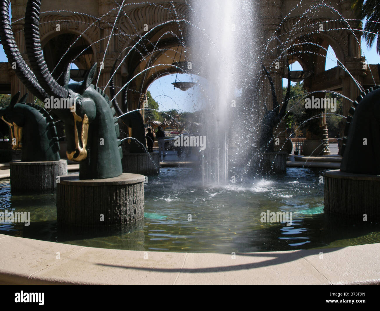 A water fountain of bronze buck at the entrance to The Palace of the Lost City in Sun City, South Africa Stock Photo