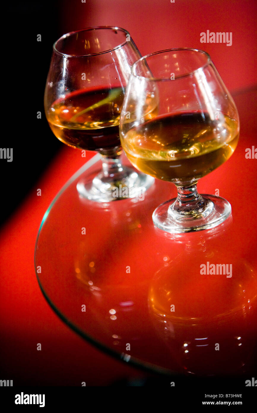 Closeup of two brandy glasses on table Stock Photo Alamy