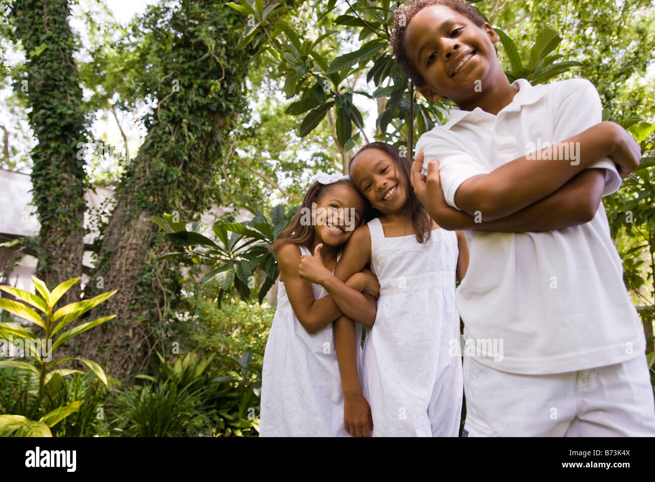 Happy African American Children Playing In Back Yard Stock Photo Alamy
