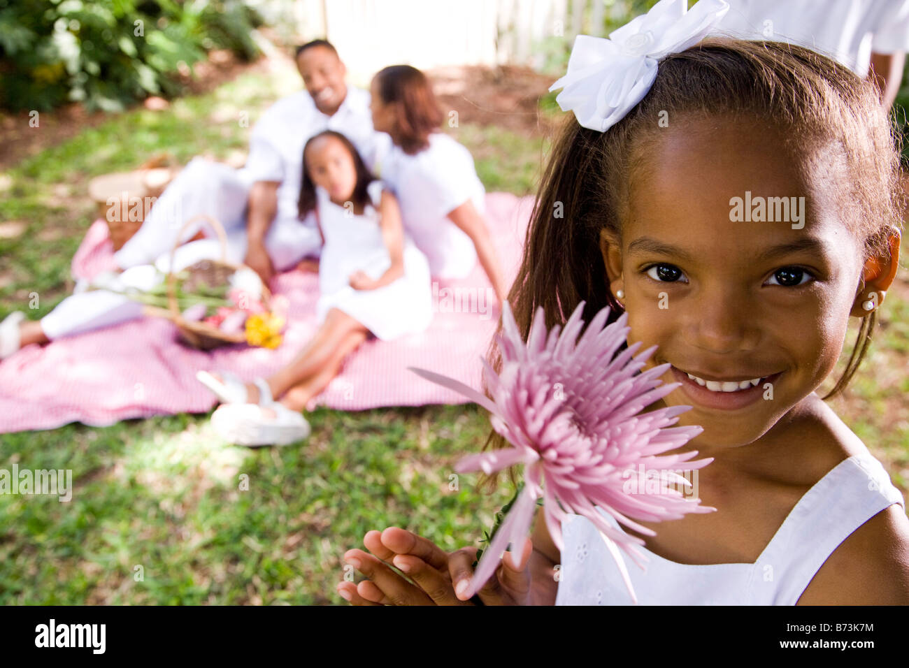 Cute african american girl holding flower hi-res stock photography and ...