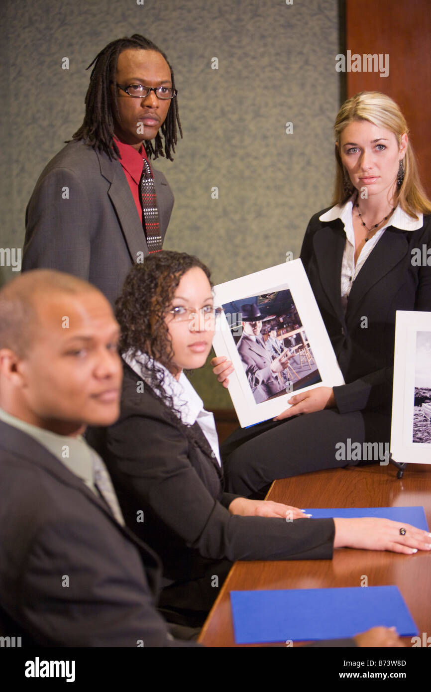 Multi-racial marketing team presenting project to clients Stock Photo