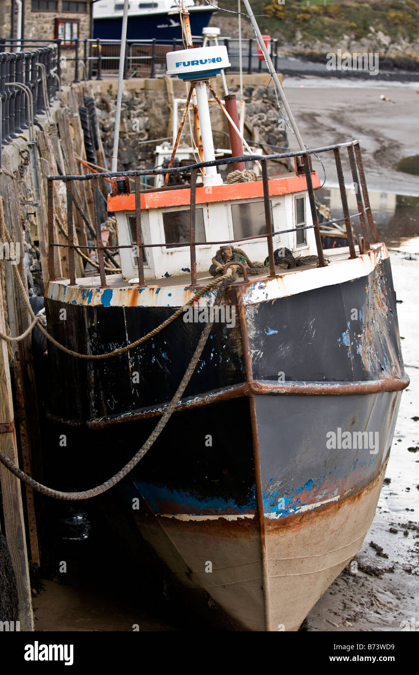 Fishing boat moored up in Barmouth Harbour Gwynedd North Wales Stock Photo