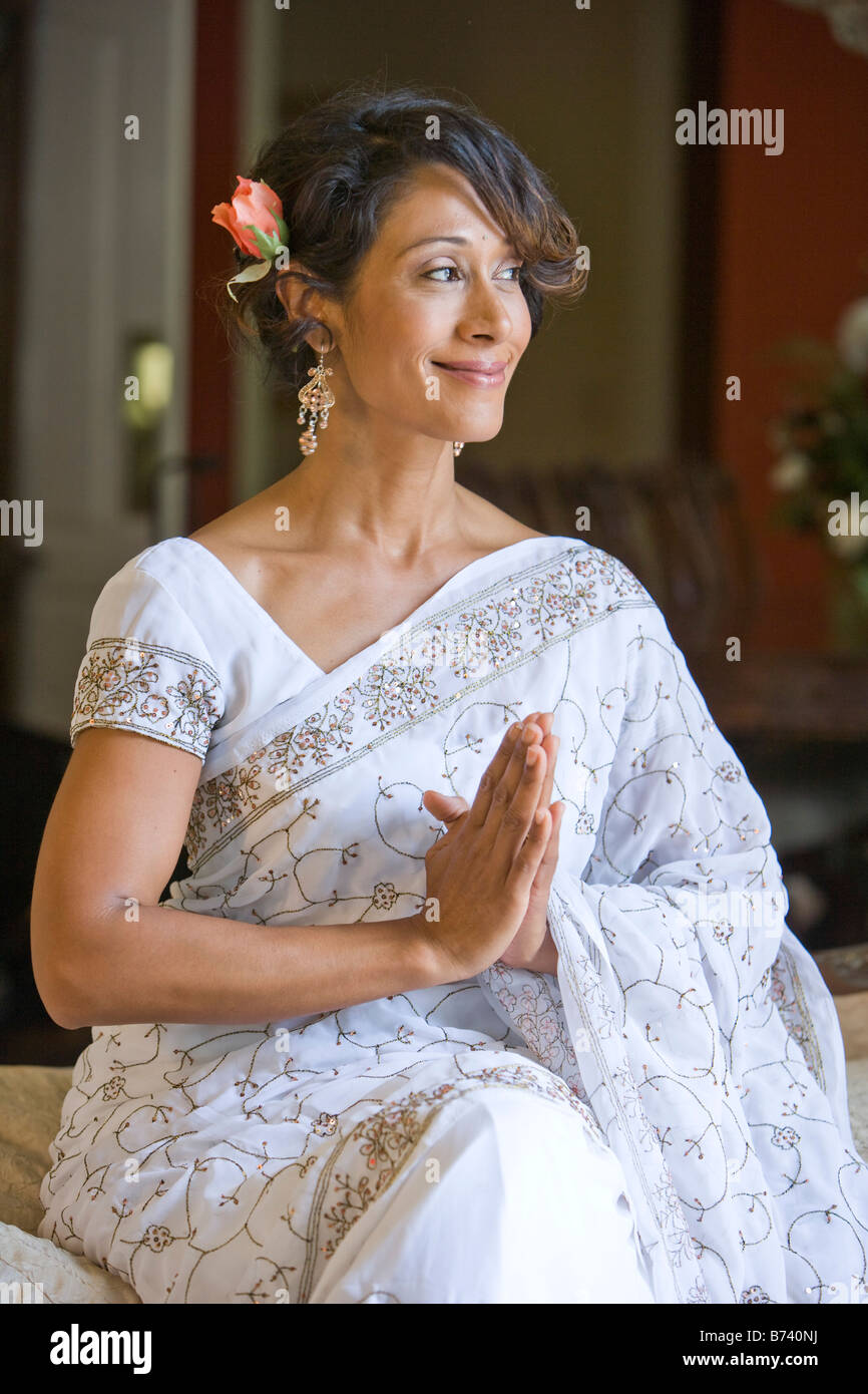 Portrait of happy middle-aged Indian woman dressed in sari Stock Photo