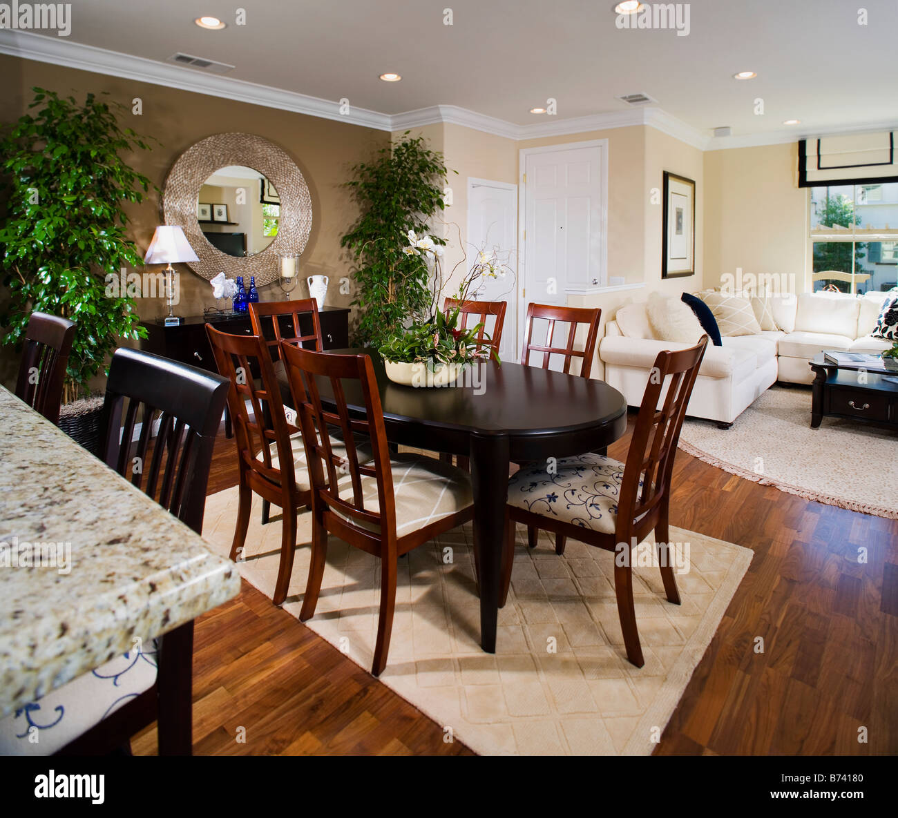small dining area between kitchen and living room Stock Photo Alamy