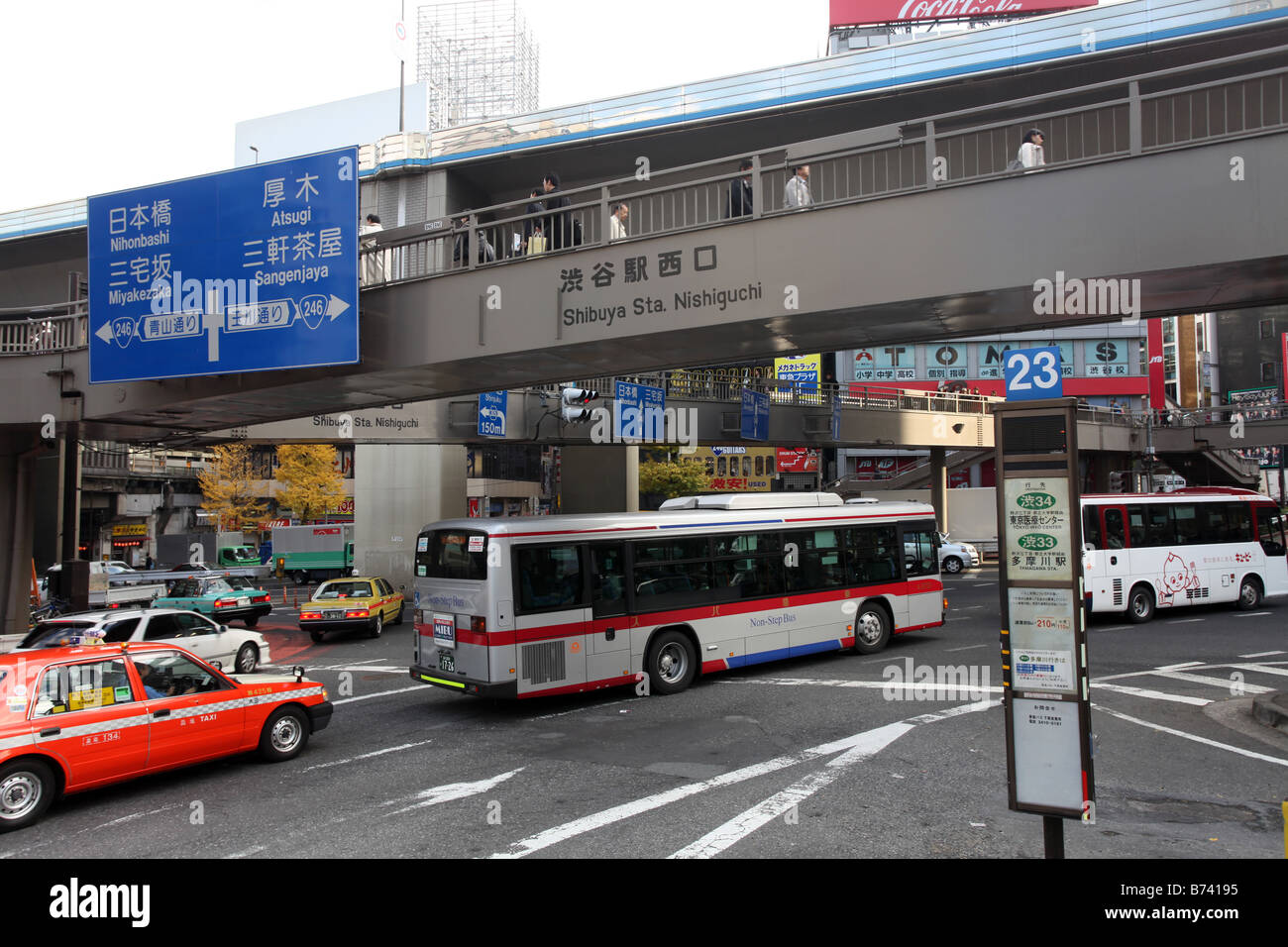 A taxi and bus in Shibuya Tokyo Stock Photo - Alamy