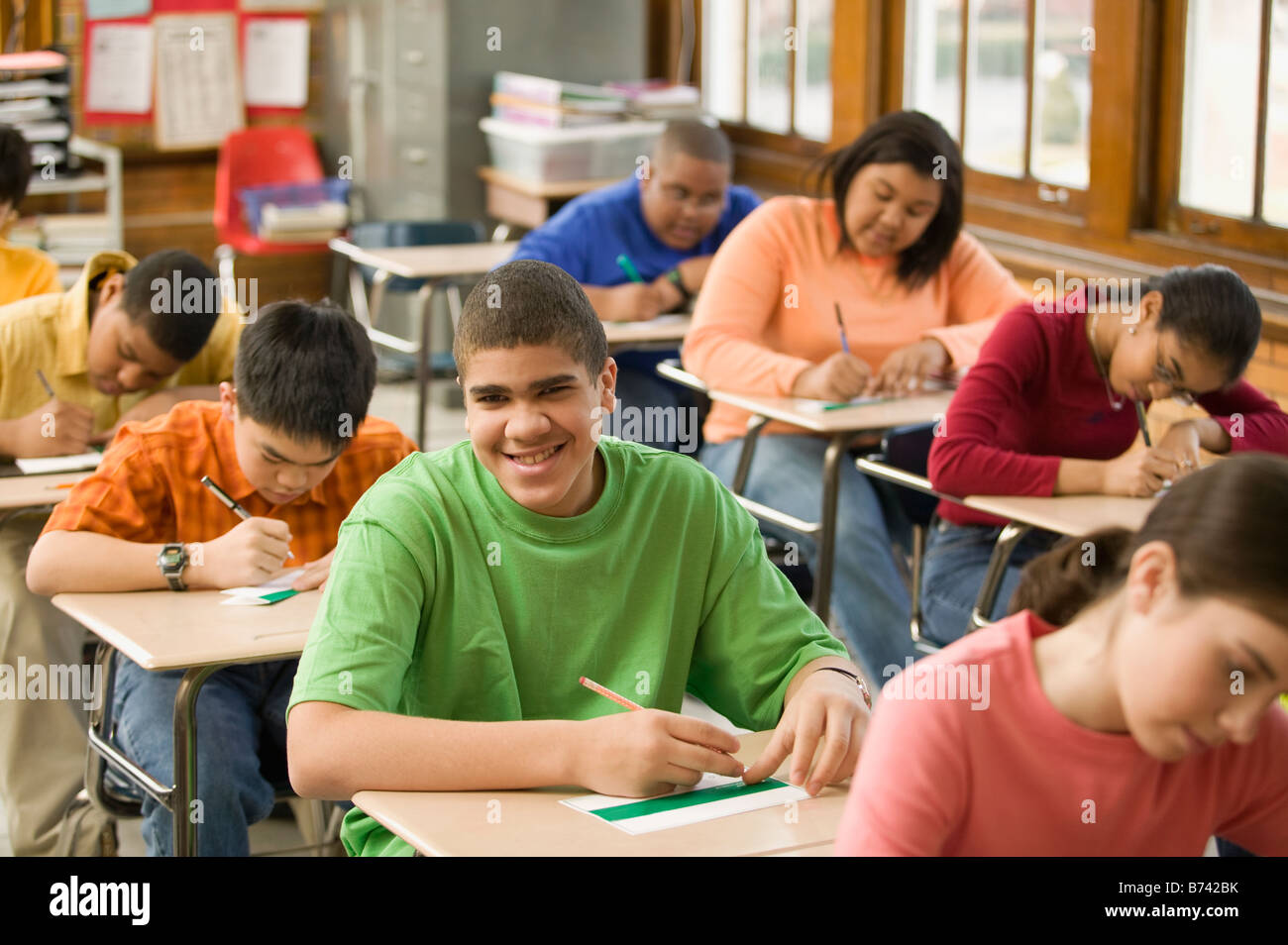 Students making name cards in classroom Stock Photo Alamy