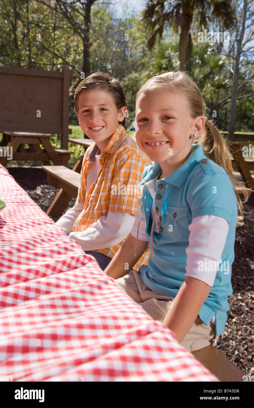 Teen girl sitting picnic table hi-res stock photography and images - Alamy
