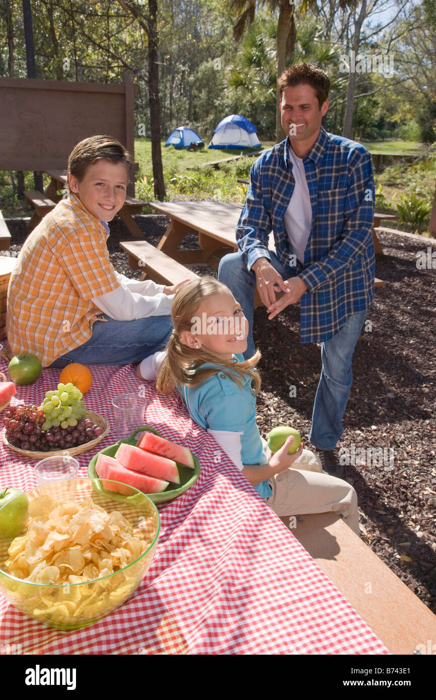 Teen girl sitting picnic table hi-res stock photography and images - Alamy