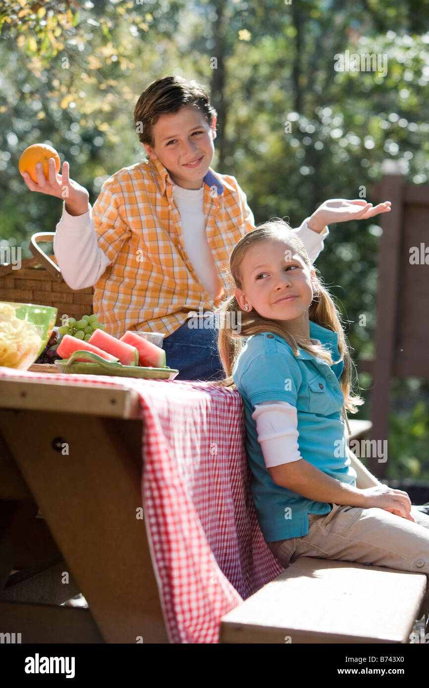 Teen girl sitting picnic table hi-res stock photography and images - Alamy