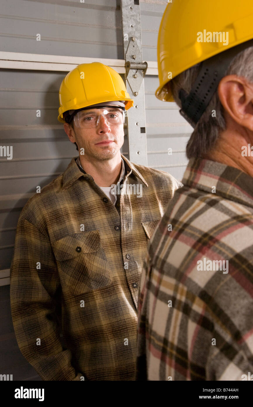 Construction workers wearing hard hats hires stock photography and images Alamy
