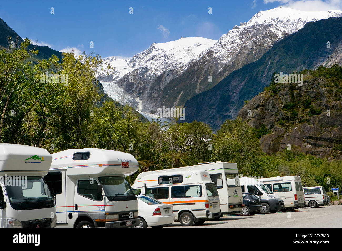 New Zealand, South Island, Franz Josef Glacier. Campers on car park. Stock Photo