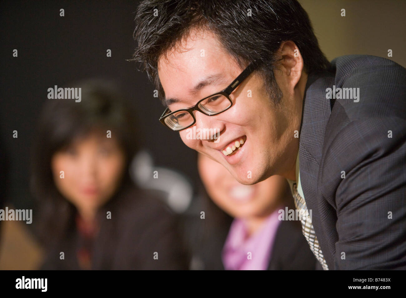 Happy asian businessman talking on hi-res stock photography and images ...