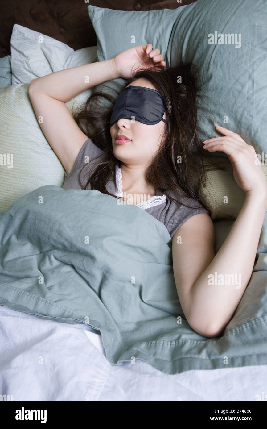 Woman sleeping with eye mask Stock Photo Alamy