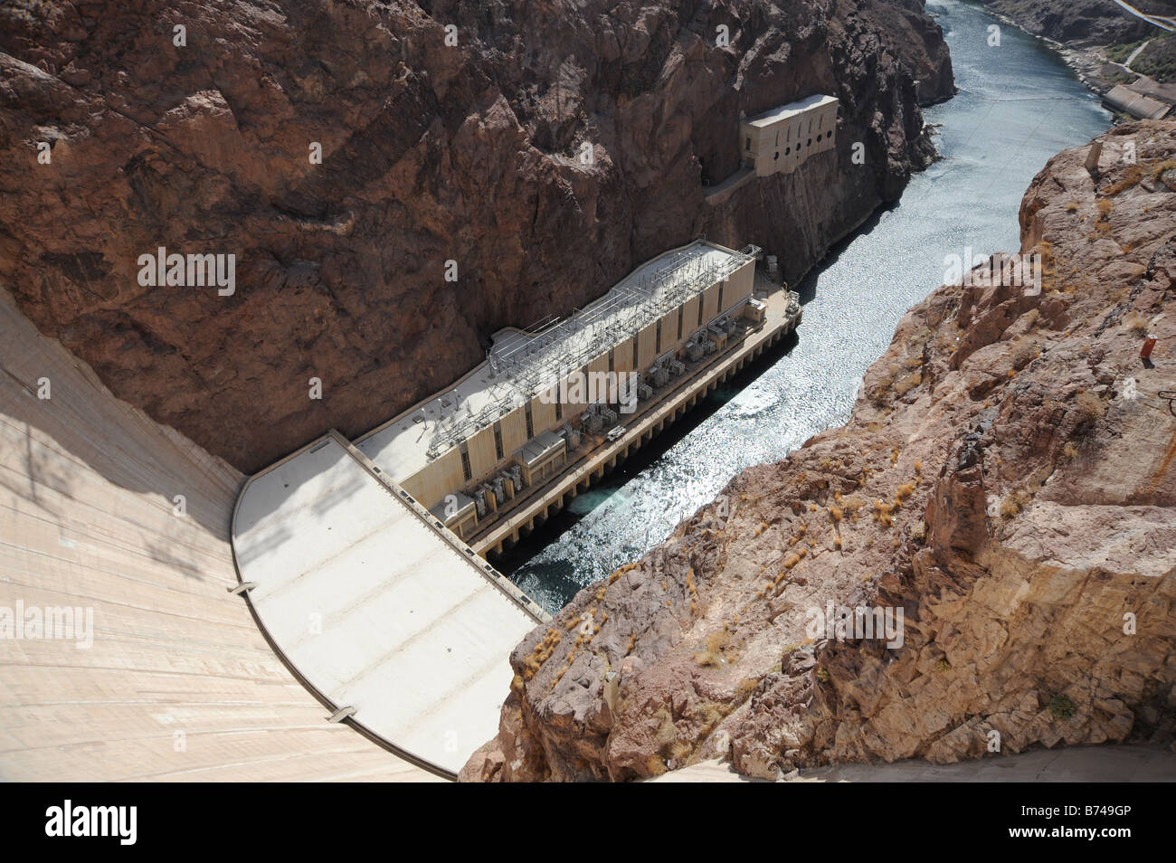 Hoover Dam face looking down into the valley at the Colorado river ...