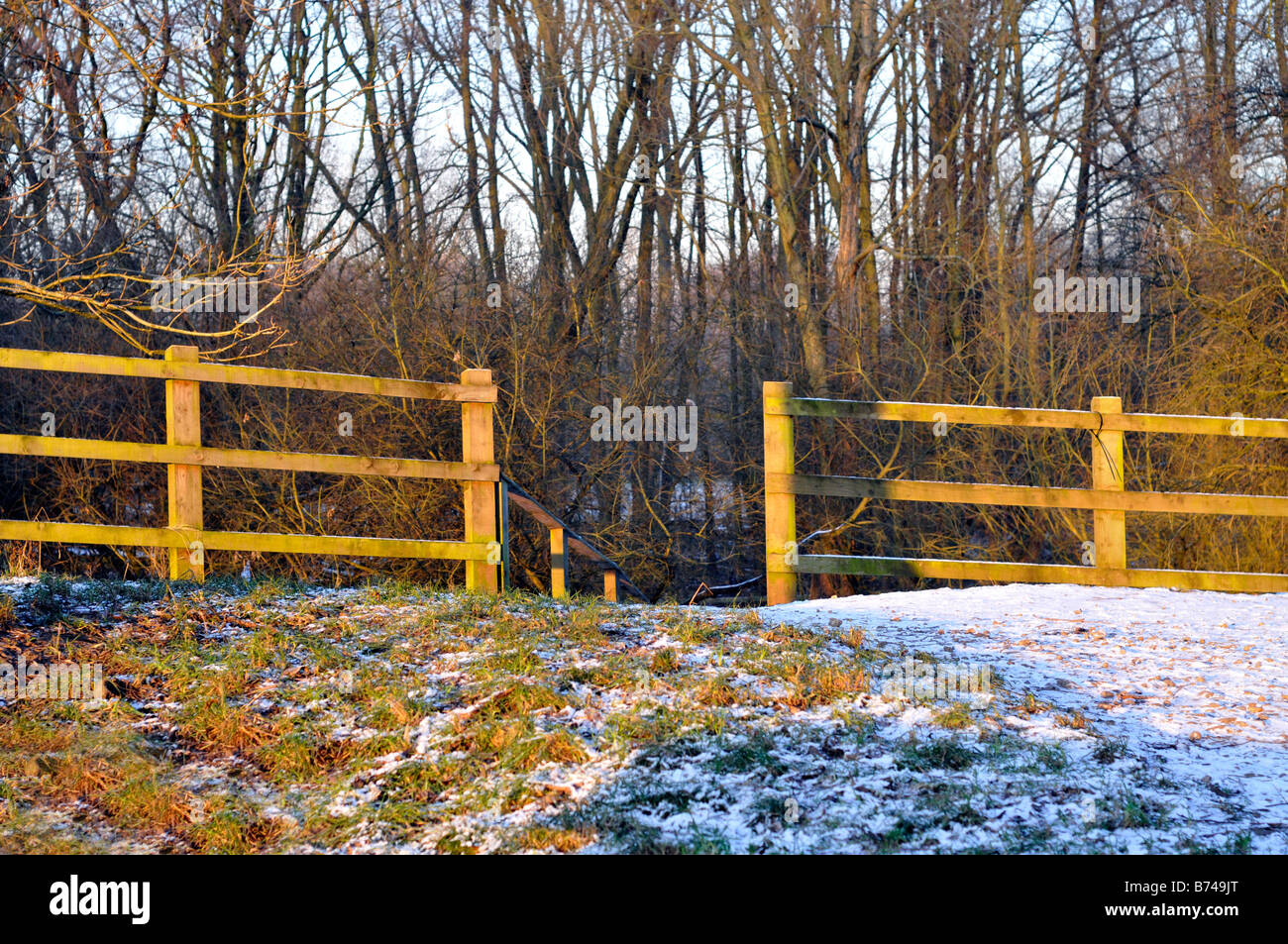 open fence leading into stenner woods,didsbury Stock Photo