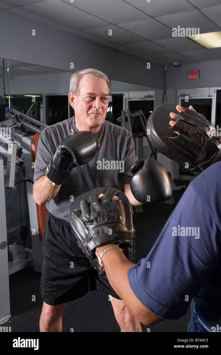 Multiethnic senior men with boxing gloves at gym Stock Photo Alamy
