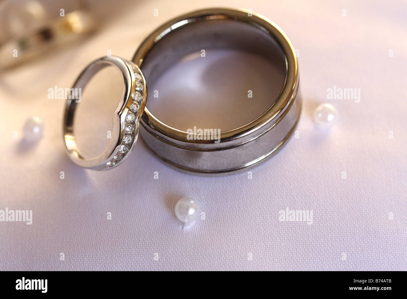 Stock Photo Of Wedding Rings On A White Beaded Pillow Stock Photo